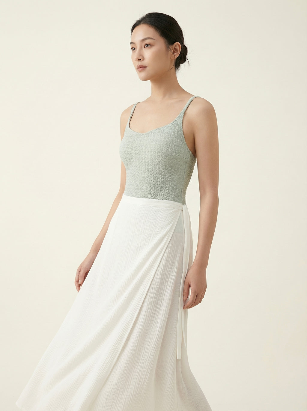 The Riviera — Sage Swim Set with Flowing Wrap Skirt - 02-model-angle